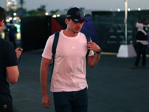 Red Bull Racing's Dutch driver Max Verstappen arrives to the paddocks at the Jeddah Corniche Circuit on Wednesday.