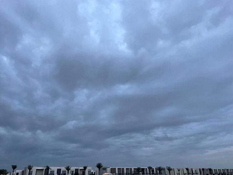 Overcast skies and heavy rain in Dubai.