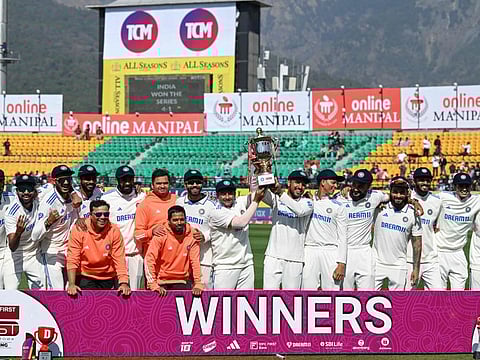 India's players with the series trophy after winning the fifth and last Test cricket match against England at the Himachal Pradesh Cricket Association Stadium in Dharamsala on Friday.