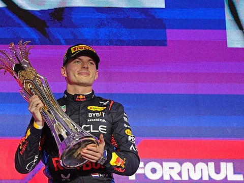 Red Bull Racing's driver Max Verstappen celebrates winning the Saudi Arabian Formula One Grand Prix during the podium ceremony at the Jeddah Corniche Circuit in Jeddah on March 9.