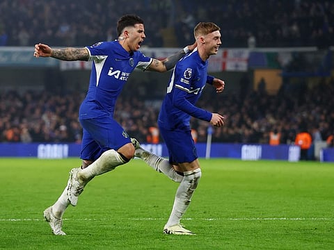 Chelsea's Cole Palmer celebrates scoring their second goal with Enzo Fernandez during a Premier League match against Newcastle United at Stamford Bridge, London.