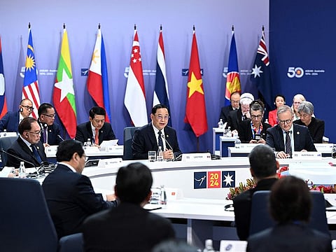 Secretary-General of ASEAN Kao Kim Hourn (C) addresses the Leaders’ Plenary during the 2024 ASEAN-Australia Special Summit at the Convention and Exhibition Centre in Melbourne on March 6, 2024. 