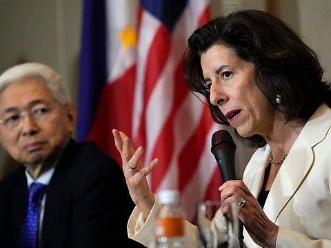 US Commerce Secretary Gina Raimondo, right, talks beside Philippine Trade and Industry Secretary Alfredo Pascual during a press conference at Paranaque city, Philippines.