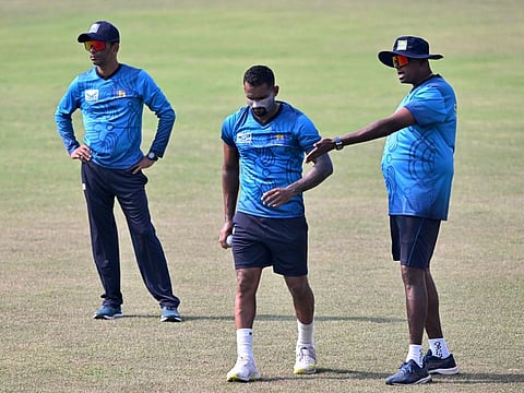 Sri Lanka Chamika Karunaratne (centre) prepares to bowl during a practice session at the Zahur Ahmed Chowdhury Stadium in Chittagong on Tuesday.