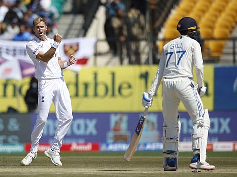 England's James Anderson celebrates the wicket of India's Shubman Gill during the fifth Test agianst India in Dharamshala on March 8.