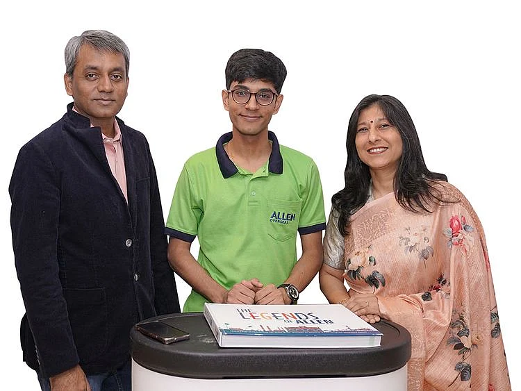 Yatharth Shah, the topper outside India in the JEE Main 2024 (Session 1), with his parents 