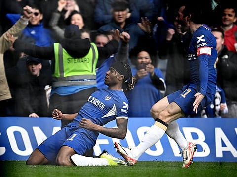 Chelsea's Noni Madueke celebrates scoring their fourth goal with Ben Chilwell during the FA Cup quarter-final match against Leicester City at Stamford Bridge, London, on Sunday.
