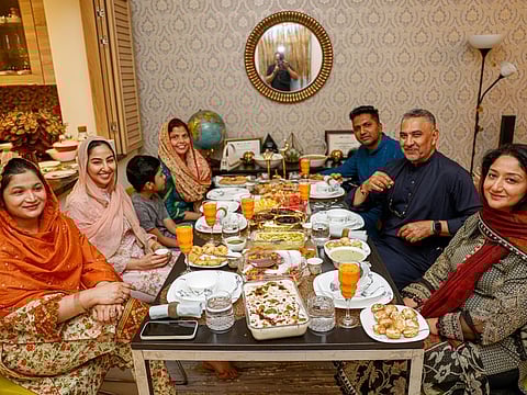 Jeelan Khan and wife Mahra Khan with Syed Junaid, Tarannum Junaid, Zoya Junaid, Farkhanda Sayeed and Aariz Omar at the Iftar at their home in Dubai. 
