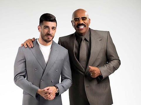 Dr. Kevin Khalili, CEO, Falcons, with Steve Harvey 