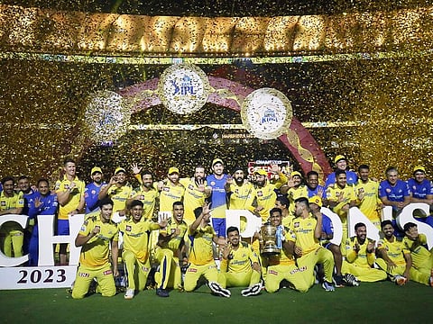 Chennai Super Kings' players celebrate after winning their fifth IPL title in Ahmedabad last year.