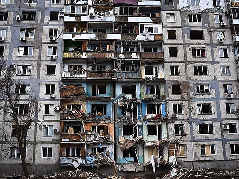 A view of the damage after Russia's air attack on residential building, in Zaporizhzhia, Ukraine, Friday, March 22, 2024. 