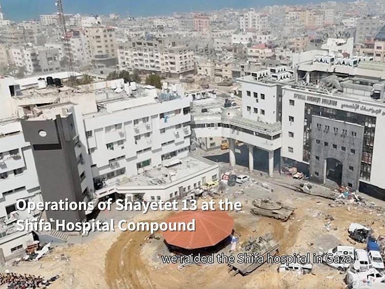  Tanks near Al Shifa hospital, where the Israeli army says weapons were found, in Gaza City, in this still image taken from video released on March 25, 2024.   
