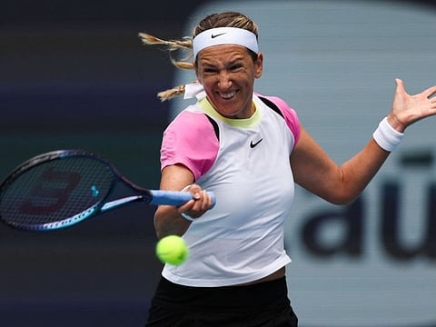 Victoria Azarenka returns a shot to Yulia Putintseva of Kazakhstan during her women's singles match during the Miami Open at Hard Rock Stadium on Tuesday.