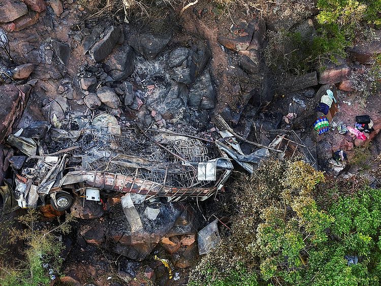 A view of the burnt remains of the bus that was taking Easter pilgrims from Botswana to Moria, following its crash near Mamatlakala in the northern province of Limpopo, South Africa March 29, 2024.