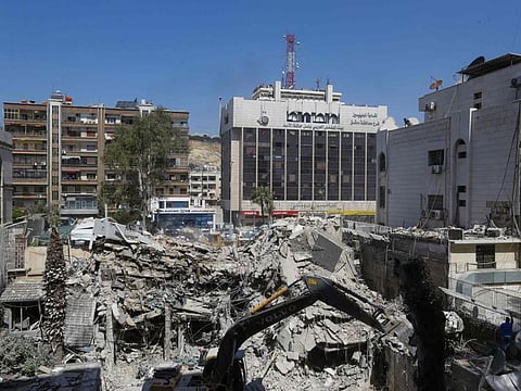 The rubble of a building annexed to the Iranian embassy is pictured a day after an air strike in Damascus on April 2, 2024.  