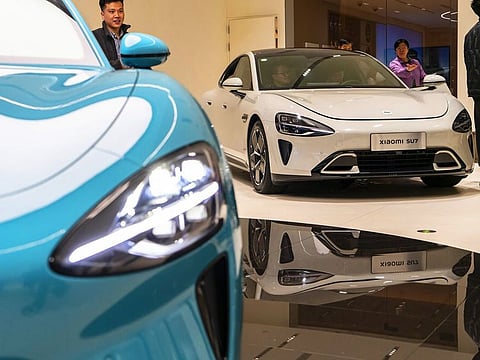 Xiaomi Corp. SU7 electric vehicles on display at one of the company's store in Shanghai, China.