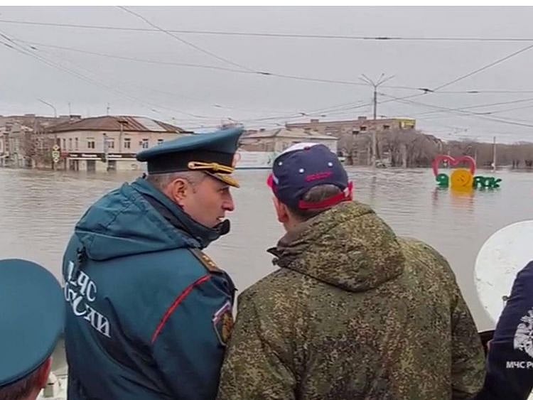  This photo taken from a video released by the Russian Emergency Situations Ministry on April 7, 2024 shows rescuers inspecting a flooded area in the town of Orsk, Orenburg region, southeast of the southern tip of the Ural Mountains.  