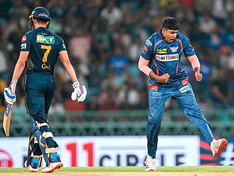 Lucknow Super Giants’ Yash Thakur celebrates the wicket of Gujarat Titans’ captain Shubman Gill during the Indian Premier League match at the Ekana Cricket Stadium in Lucknow on Sunday.
