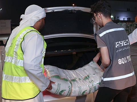File photo of Sharjah Charity distributing a donation for Zakat Al Fitr