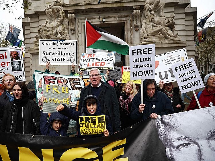 Kristinn Hrafnsson (centre) editor-in-chief of WikiLeaks joins supporters of WikiLeaks founder Julian Assange protest 