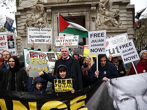 Kristinn Hrafnsson (centre) editor-in-chief of WikiLeaks joins supporters of WikiLeaks founder Julian Assange protest outside the Australian High Commission in central London on April 10, 2024, on the eve of the fifth anniversary of his arrest by British police. 