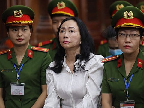 Vietnamese property tycoon Truong My Lan (C) looks on at a court in Ho Chi Minh city on April 11, 2024.  