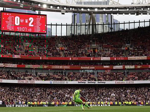 Aston Villa's goalkeeper Emiliano Martinez takes a kick during the English Premier League match against Arsenal at the Emirates Stadium in London on Sunday.