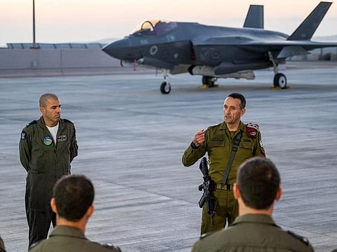 Israeli army Chief of the General Staff Lieutenant General Herzi Halevi speaking to military officers at Nevatim airbase in southern Israel on April 15, 2024. Israel's army chief on April 15 vowed a response to Iran's unprecedented attack against the country which has prompted appeals for de-escalation by world leaders fearing wider conflict.  