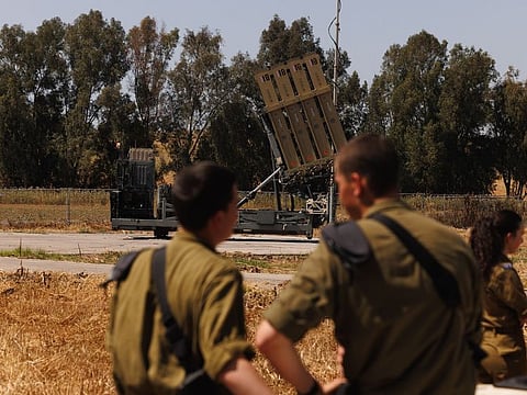 Israeli soldiers at an Iron Dome anti-missile battery site near the Gaza border in southern Israel, on Wednesday, April 17, 2024.  