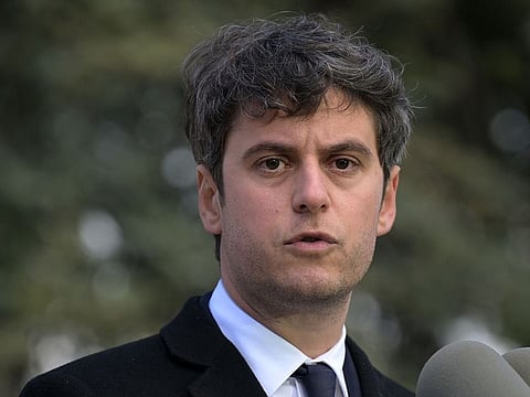 France's Prime Minister Gabriel Attal delivers a speech at the town all square during a visit to mark his 100th day in Matignon, in Viry-Chatillon, south of Paris, on April 18, 2024.  