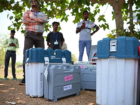 Polling officials with Electronic Voting Machines (EVMs) at the Police Lines in Sukma, in India’s Chhattisgarh state 