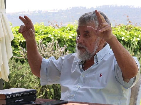 Former Israeli Mossad agent and author Mishka Ben-David is pictured at his home in Ramat Raziel on April 15, 2024.  