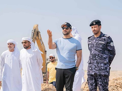 Sheikh Sultan bin Ahmed bin Sultan Al Qasimi during his inspection of temporary basins created for draining and storing rainwater.