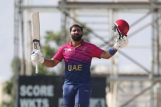 UAE captain Muhammad Waseem celebrates his century against Oman in the ACC Premier Cup at Al Ameerat ground in Oman on Sunday.
