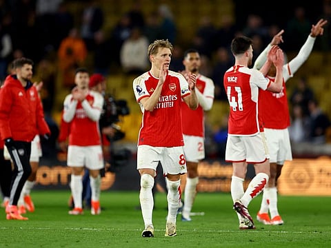 Arsenal's Martin Odegaard celebrates after the Premier League match against Wolverhampton Wanderers at the Molineux Stadium on April 20.