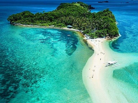 The Philippines, an archipelago in the western Pacific, is spread over 7,640 islands. Photo shows Aslom Island, off the main Mindoro island (land area: 10,572 km²).