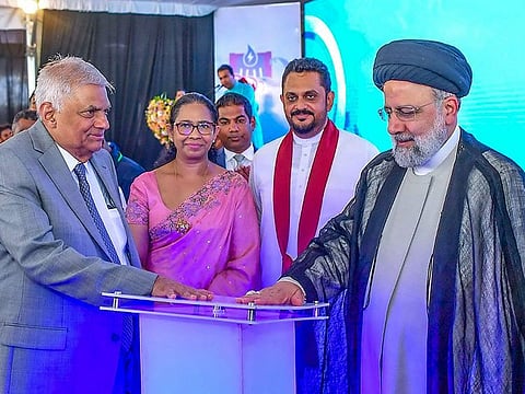 Iran's President Ebrahim Raisi (right) and Sri Lankan President Ranil Wickremesinghe (left) inaugurating the Uma Oya irrigation and hydro-electricity project in Badulla district of Sri Lanka.  