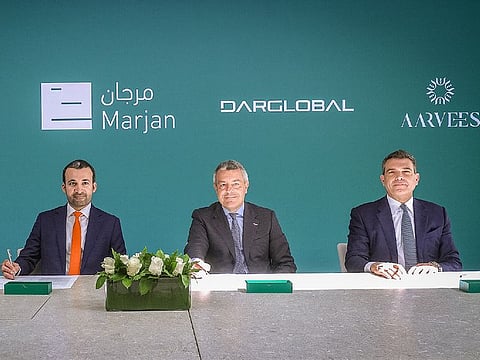 (L-R) Abdulla Al Abdouli, CEO of Marjan; Stefano Saporetti, Director of Brand Diversification at Aston Martin; Ziad El Chaar, CEO of Dar Global
