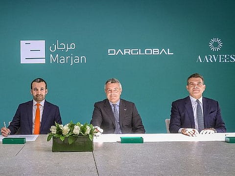 (L-R) Abdulla Al Abdouli, CEO of Marjan; Stefano Saporetti, Director of Brand Diversification at Aston Martin; Ziad El Chaar, CEO of Dar Global