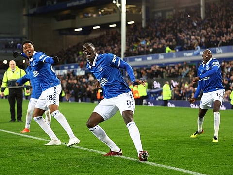 Everton's Youssef Chermiti, Amadou Onana and Abdoulaye Doucoure celebrate after the Premier League match against Liverpool at Goodison Park on Wednesday.