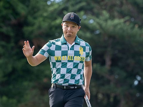 Jinichiro Kozuma of Iron Heads GC reacts to his putt on the tenth green during the first round of LIV Golf Adelaide