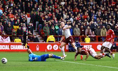 Manchester City's Erling Braut Haaland scores their second goal during a Premier League match against Nottingham Forest at The City Ground, Nottingham, on Sunday.
