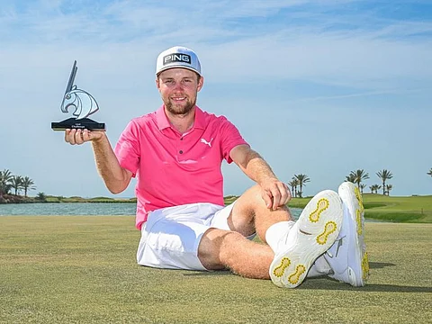 Rasmus Neergaard-Petersen celebrates his victory at the UAE Challenge