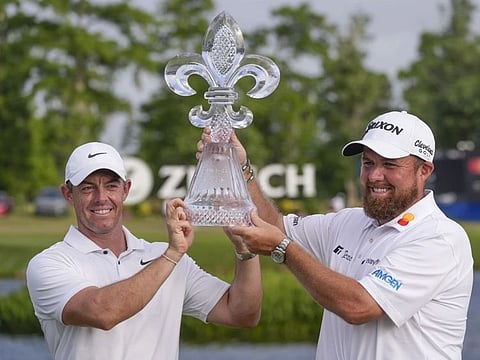 McIlroy and Lowry celebrate their triumph in New Orleans
