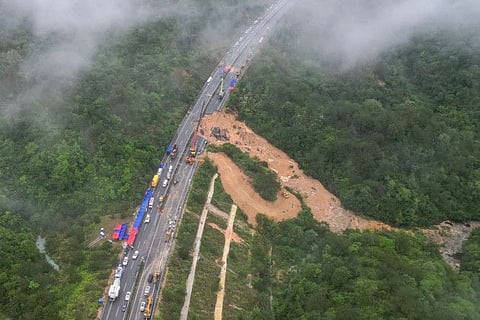 This photo taken on May 1, 2024 shows an aerial view of a collapsed section of a highway near Meizhou, in southern Chinas Guangdong province.  