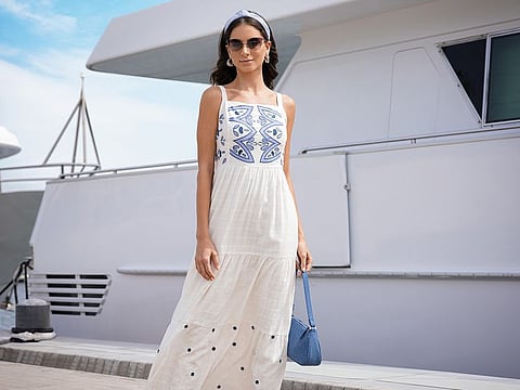 Max Fashion’s classic white dress with a dash of blue is perfect for summer