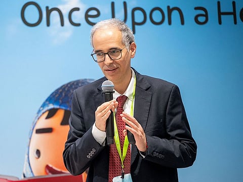 Moroccan mathematics professor Aziz Afrazin speaking at the Sharjah Children's Reading Festival on Thursday.
