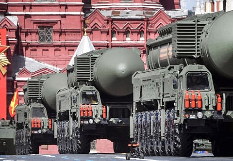 Russian Yars intercontinental ballistic missile launchers parade through Red Square during the Victory Day military parade in central Moscow on May 9, 2022. President Vladimir Putin has ordered the Russian military to hold nuclear weapons drills involving the navy and troops based near Ukraine.  