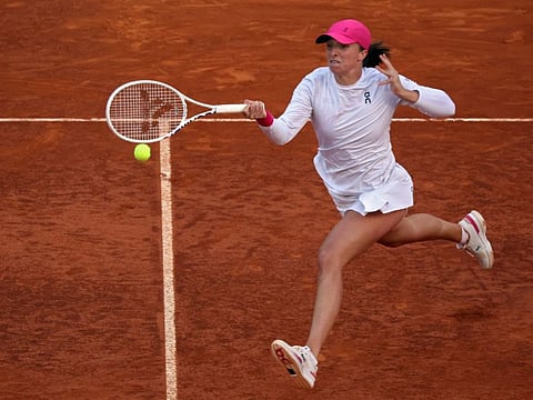 Poland's Iga Swiatek in action against Belarus' Aryna Sabalenka during the 2024 WTA Tour Madrid Open tournament last week.