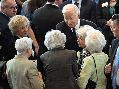 US President Joe Biden greets Holocaust survivors during the annual Days of Remembrance ceremony for Holocaust survivors at the US Capitol in Washington, DC, on May 7, 2024.  